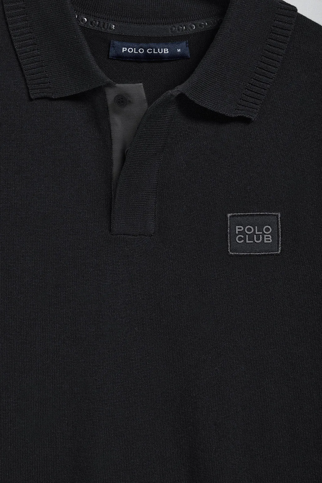 Polo de punto color negro de manga corta y logo Polo Club